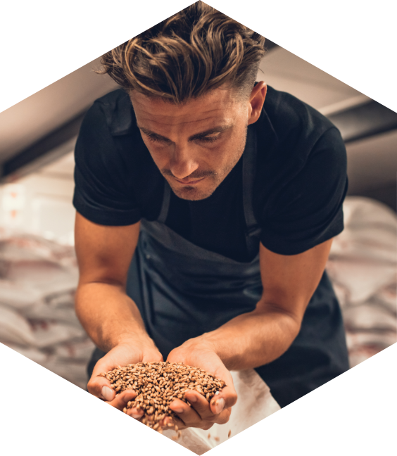 Image showing a man with hands full of seeds